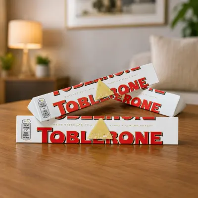 Toblerone White Chocolate with Honey & Almond Nougat 100g | Imported Swiss Chocolate